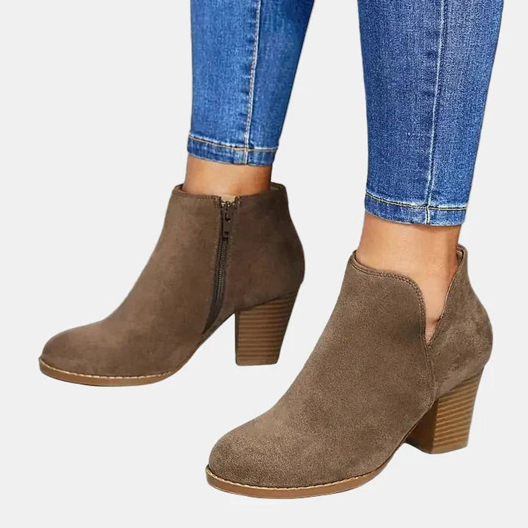 Adeline suede-look block heel ankle boots, side view with skinny jeans