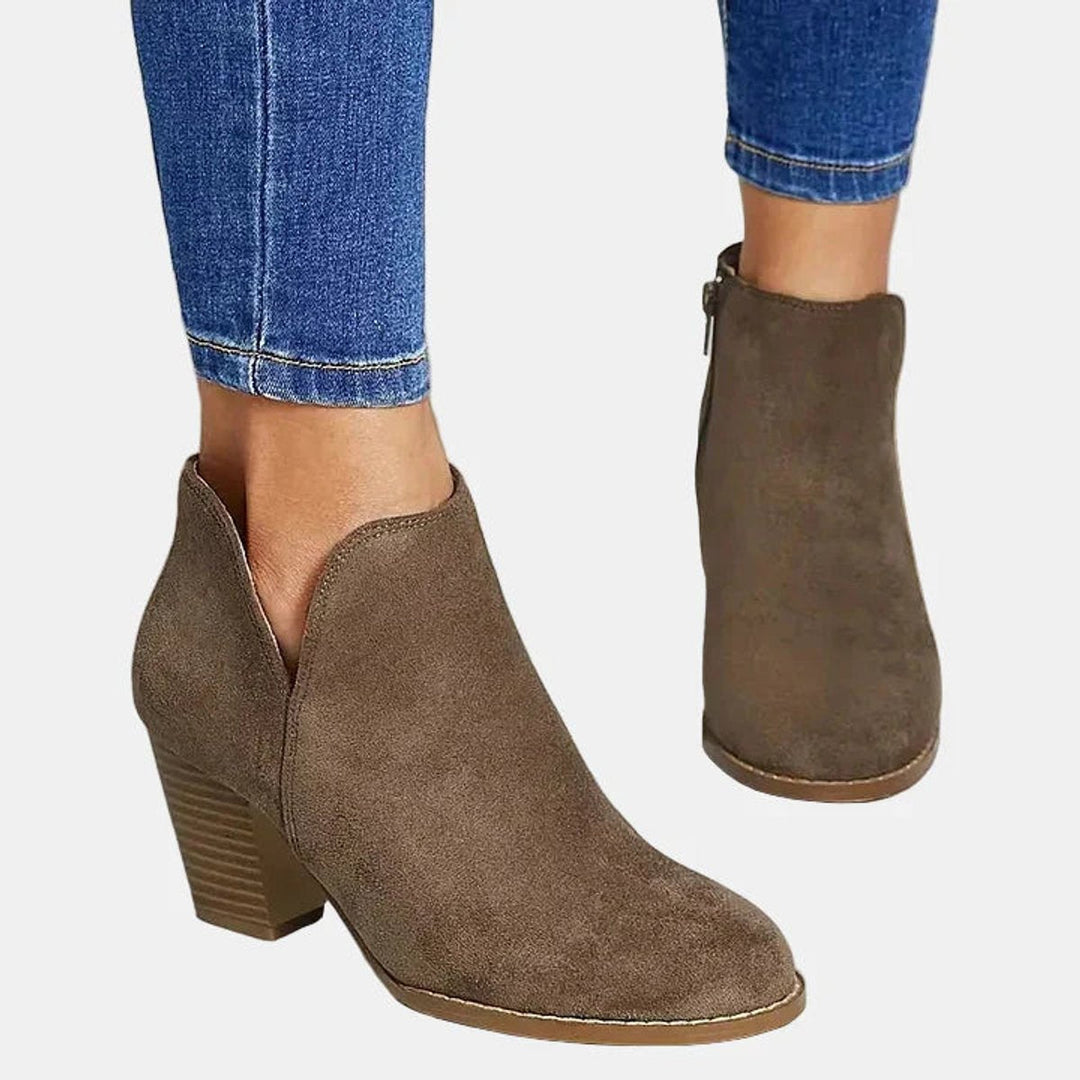 Adeline block heel ankle boots, close-up front view showing zip and cut-out detail