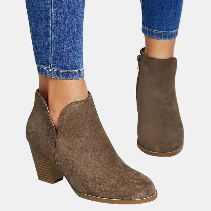 Adeline block heel ankle boots, close-up front view showing zip and cut-out detail