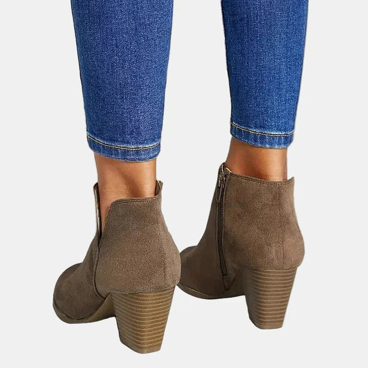 Adeline block heel ankle boots, back view showing heel and zip pull