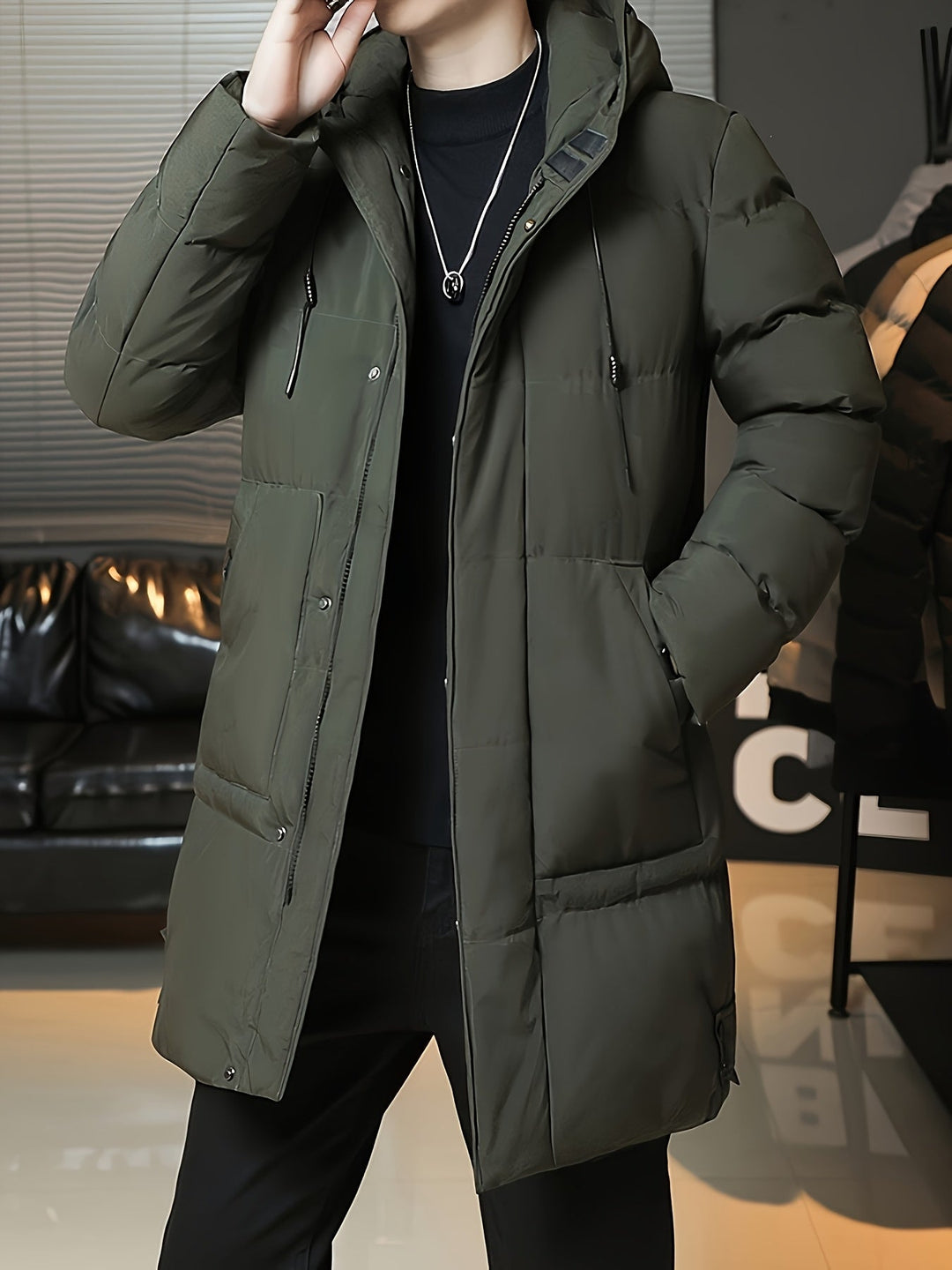 Back view of Barnaby green longline puffer coat