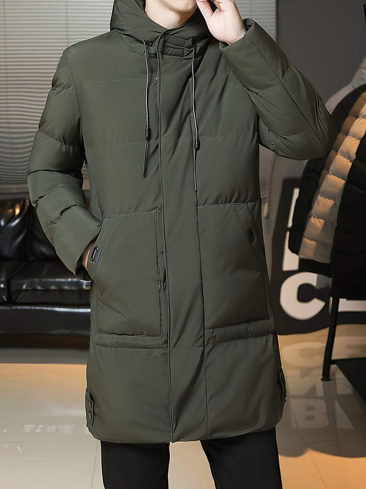 Man wearing Barnaby grey puffer coat, front view with hood up