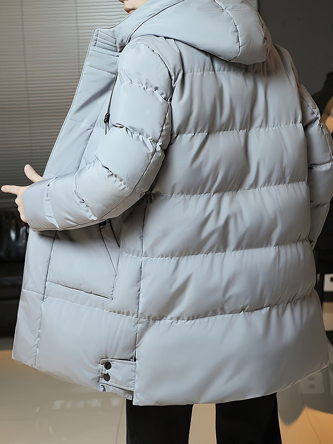 Man wearing Barnaby grey coat, close-up on hood and collar