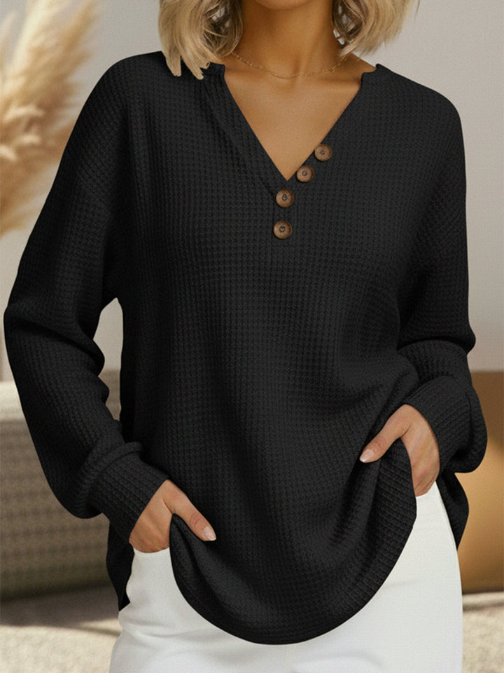 Bridget button front V-neck waffle knit jumper in black, front view
