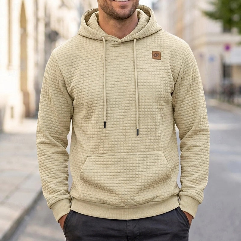 Callum khaki textured waffle hoodie, front view on model
