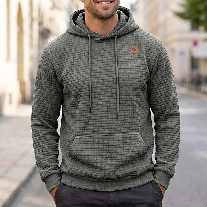 Callum grey textured waffle hoodie, front view on model