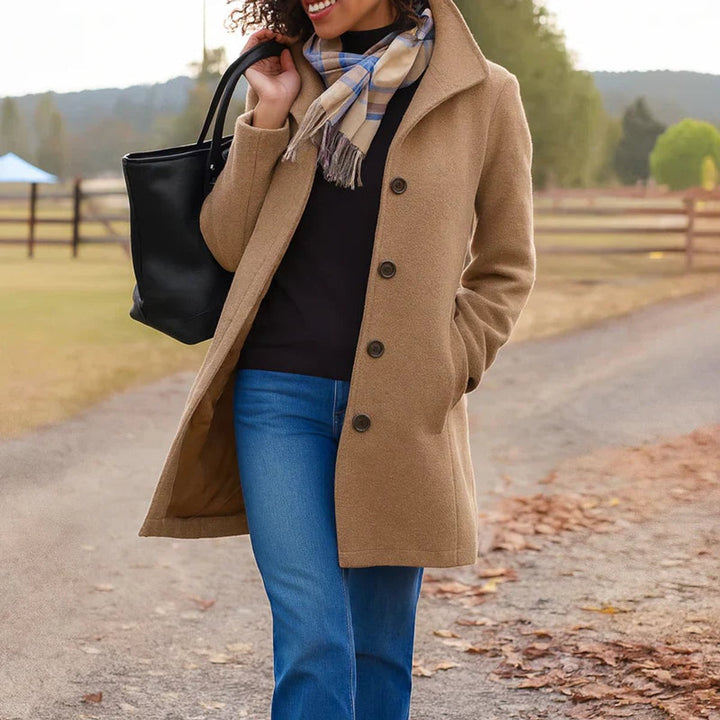 Cecily classic single-breasted mid-length coat in khaki, front view with scarf and tote bag
