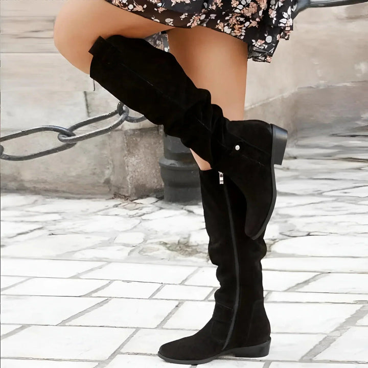 Clementine knee high boots in black, back view seated