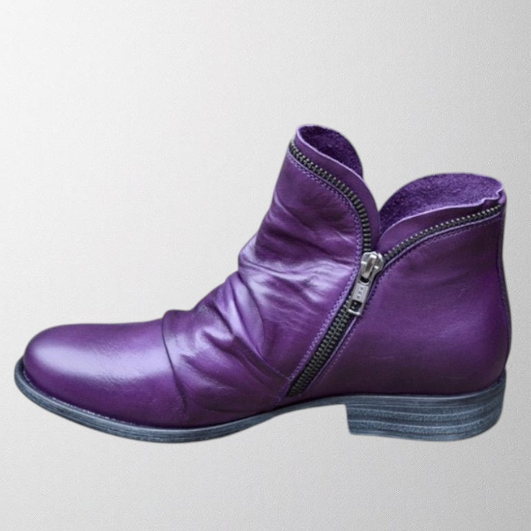 Clementine slouch ankle boot in purple with side zip detail, side view