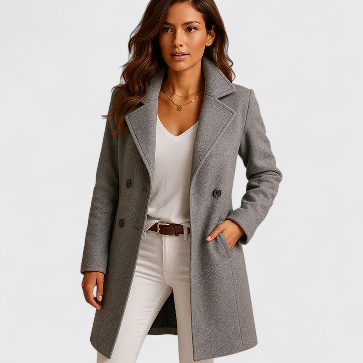 Cressida notched lapel double-breasted midi coat in grey, front view with hands in pockets