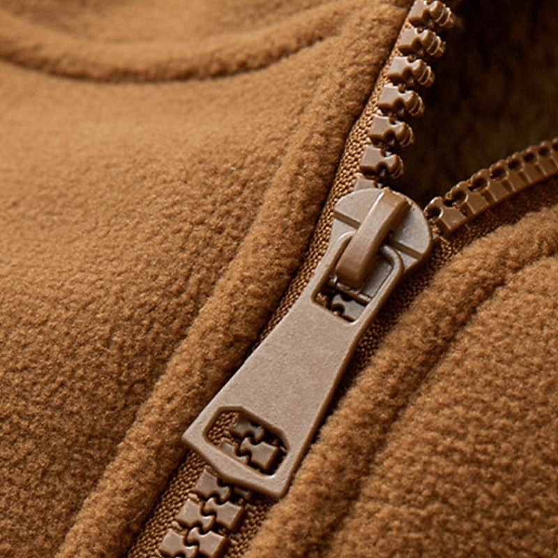 Close-up of the zip pull and fleece fabric detail