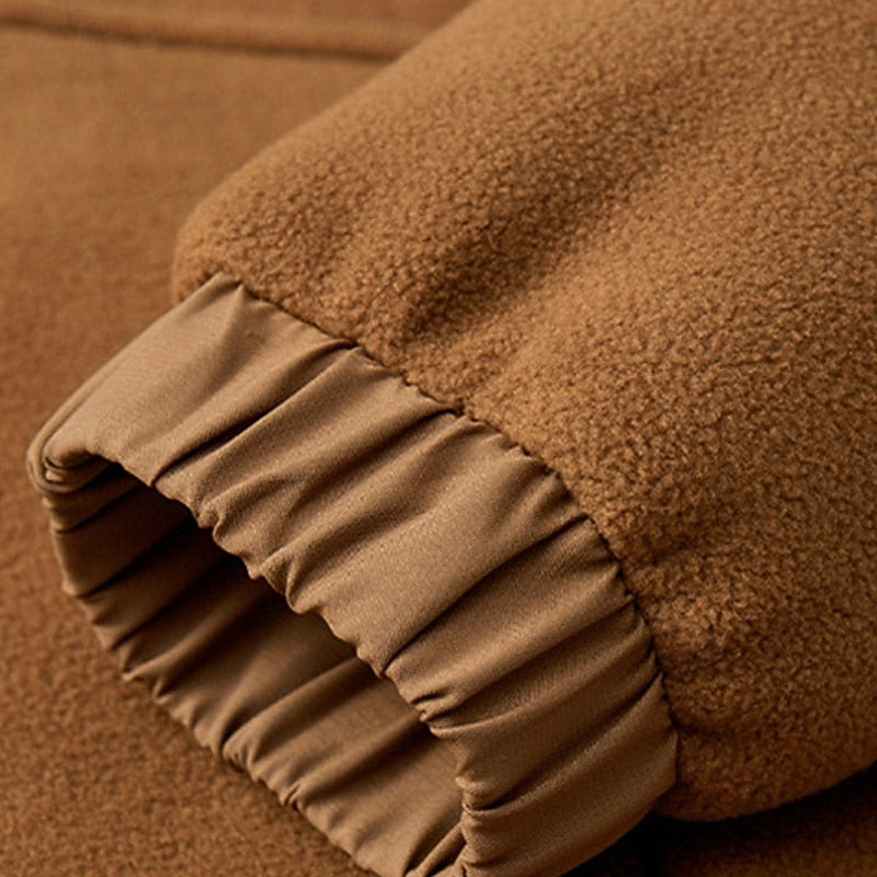 Close-up of the ribbed cuff and elastic hem detail