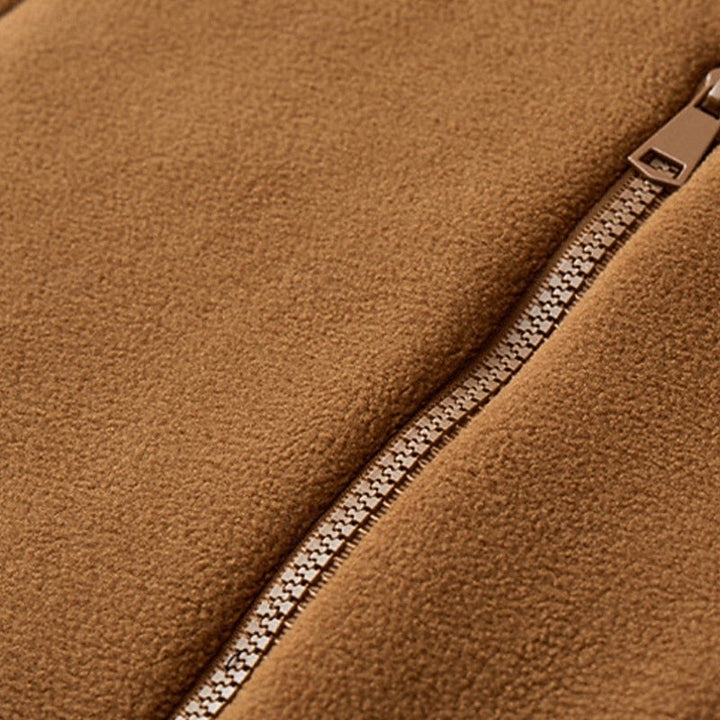 Close-up of the fleece fabric texture and zip seam