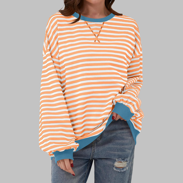 Eleanora striped long sleeve sweatshirt in orange and white with blue trim, front view