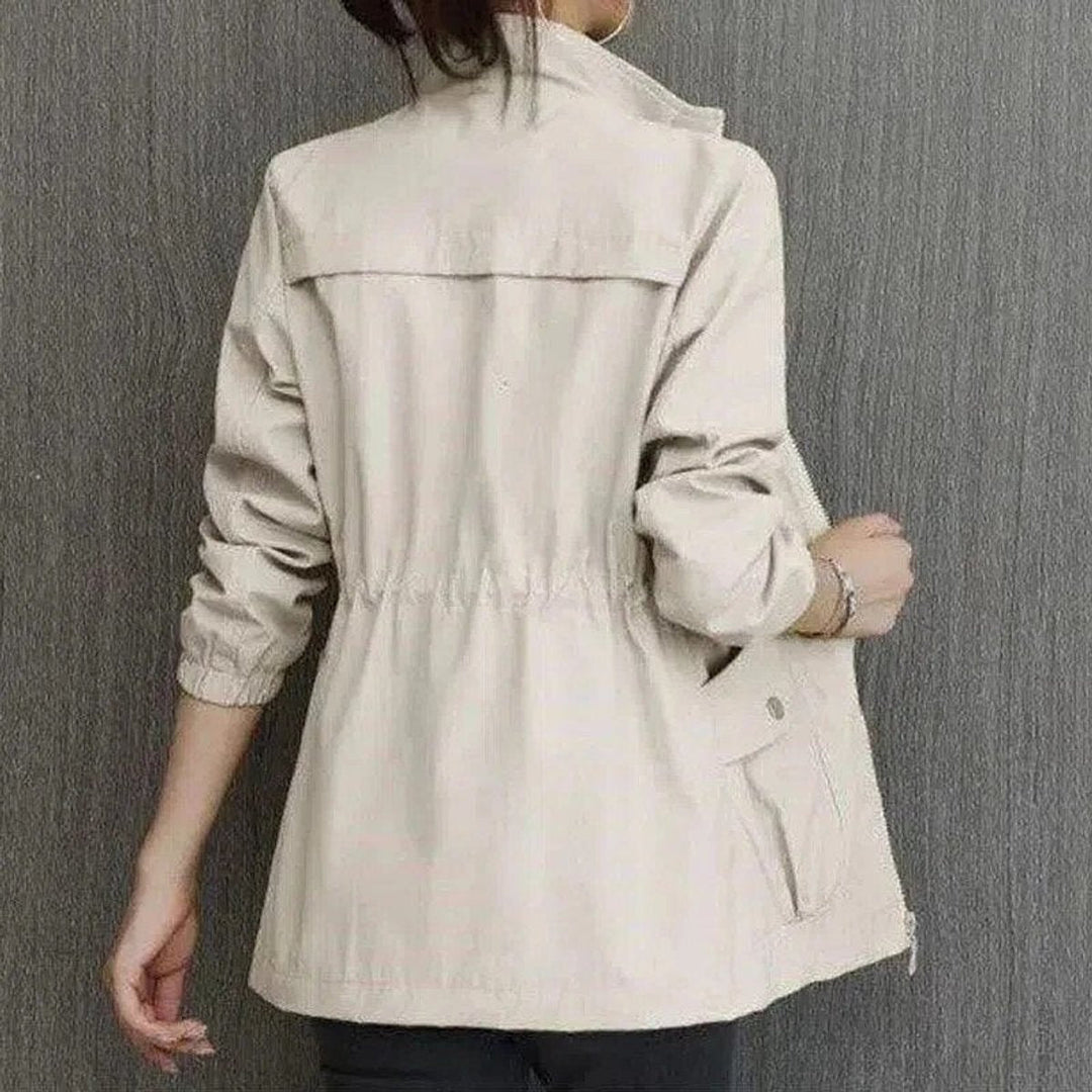 Felicity zip-up jacket in beige, back view with cargo pockets