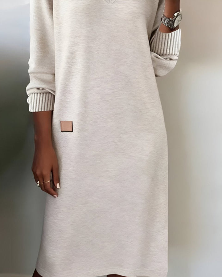Freya oatmeal midi dress, close-up of sleeve and leather patch detail