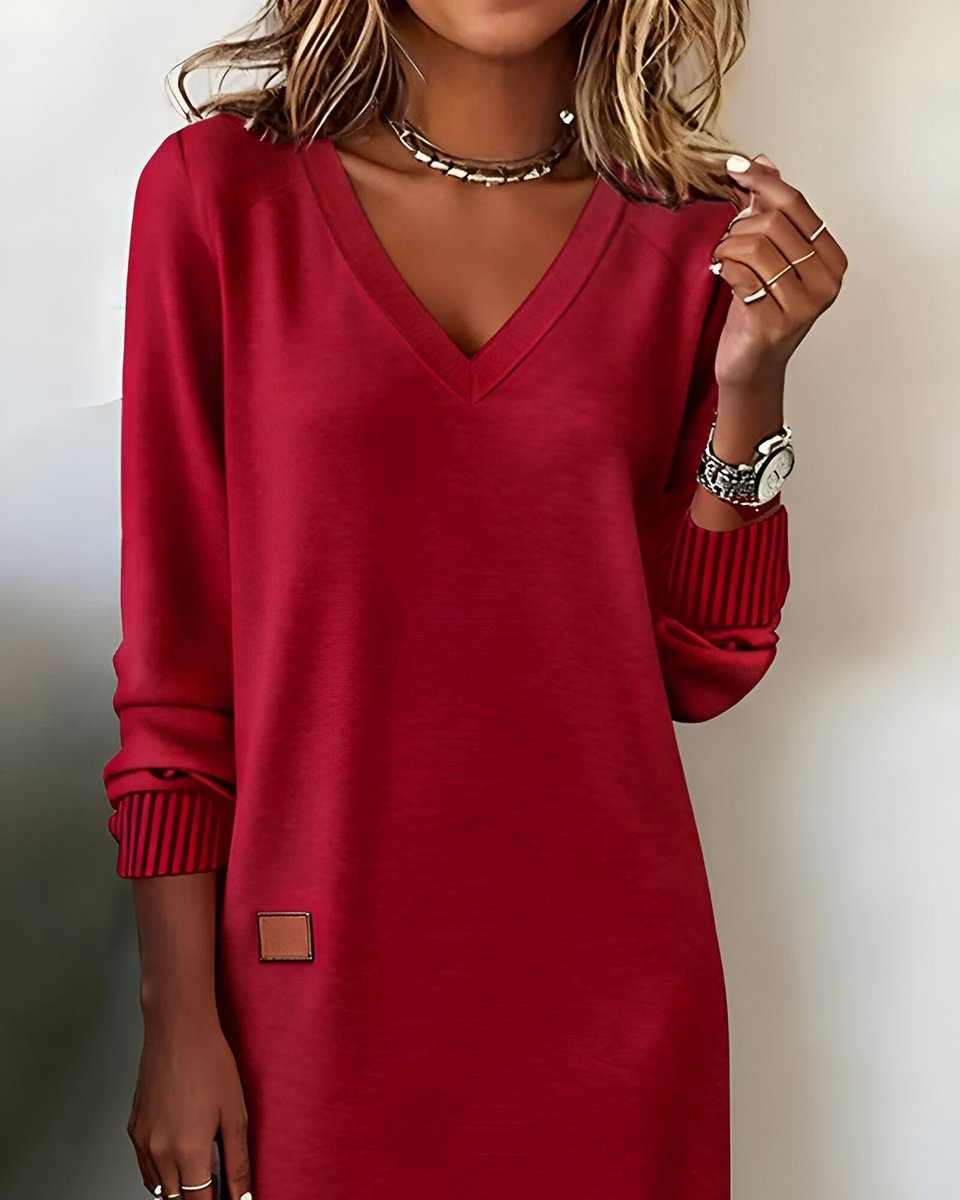 Freya red midi dress, close-up of V-neckline and striped cuff