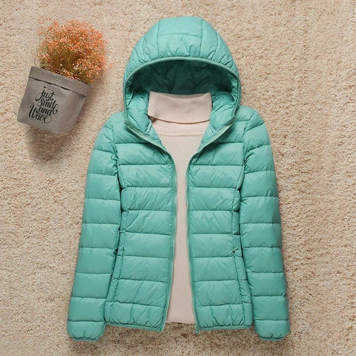 Harriet lightweight hooded packable puffer jacket in turquoise, front view
