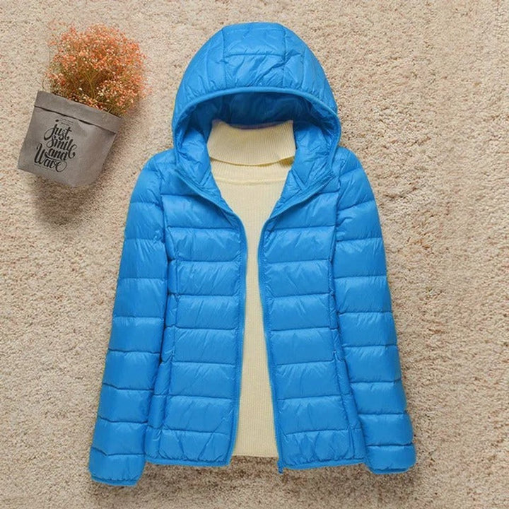 Harriet lightweight hooded packable puffer jacket in light blue, front view