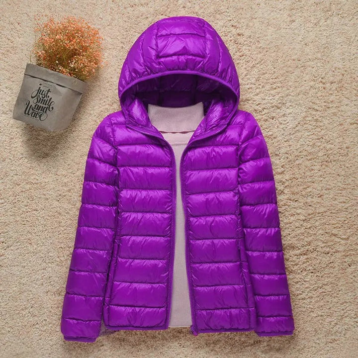 Harriet lightweight hooded packable puffer jacket in lilac, front view