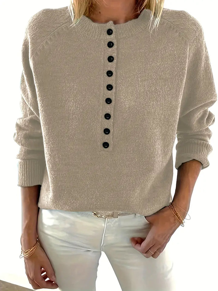 Henrietta beige notch collar jumper with button detail, front view