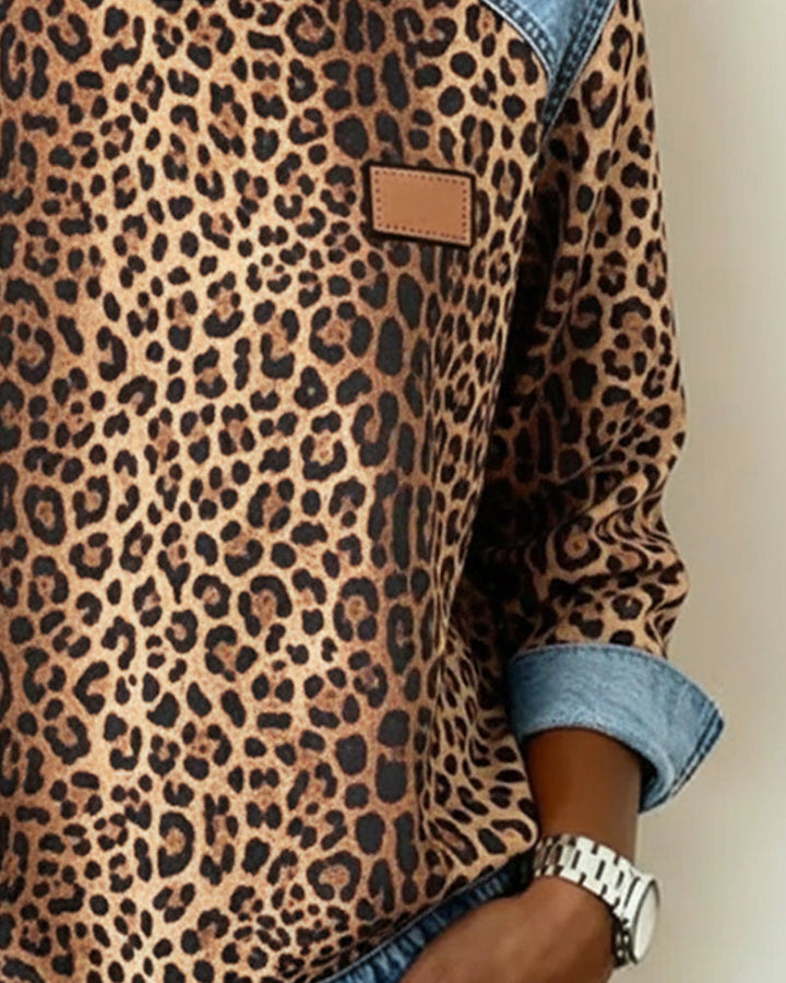 Isadora leopard print sweatshirt, side view with cuffed sleeve detail