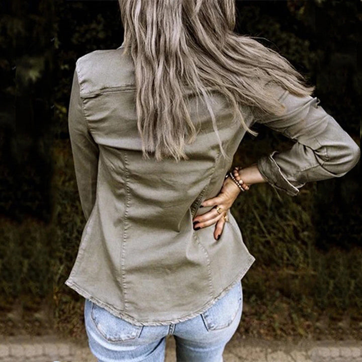 Isla fitted denim jacket back view showing seam detailing and curved hem