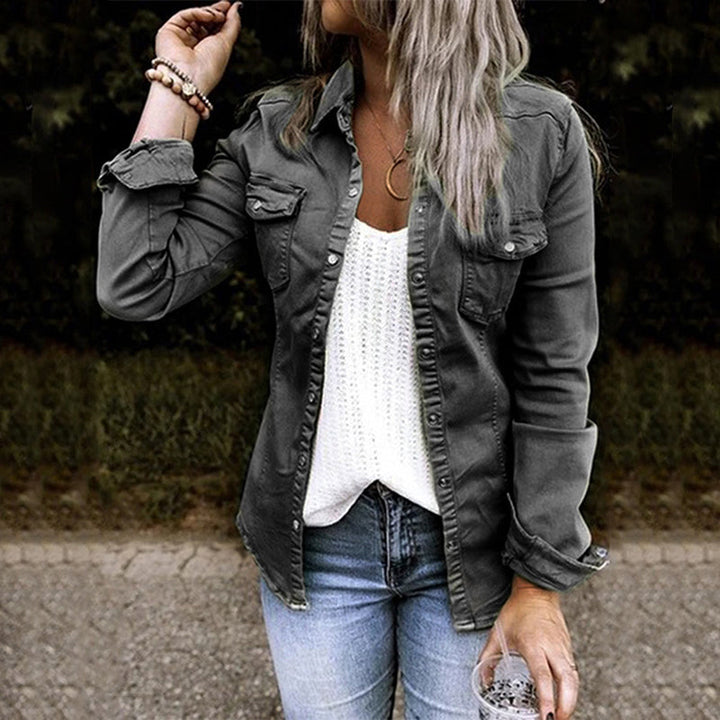 Isla denim jacket front view with collar and chest pocket detail