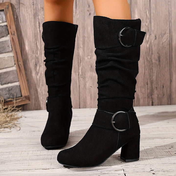 Isolde knee high boots in black, front view on model