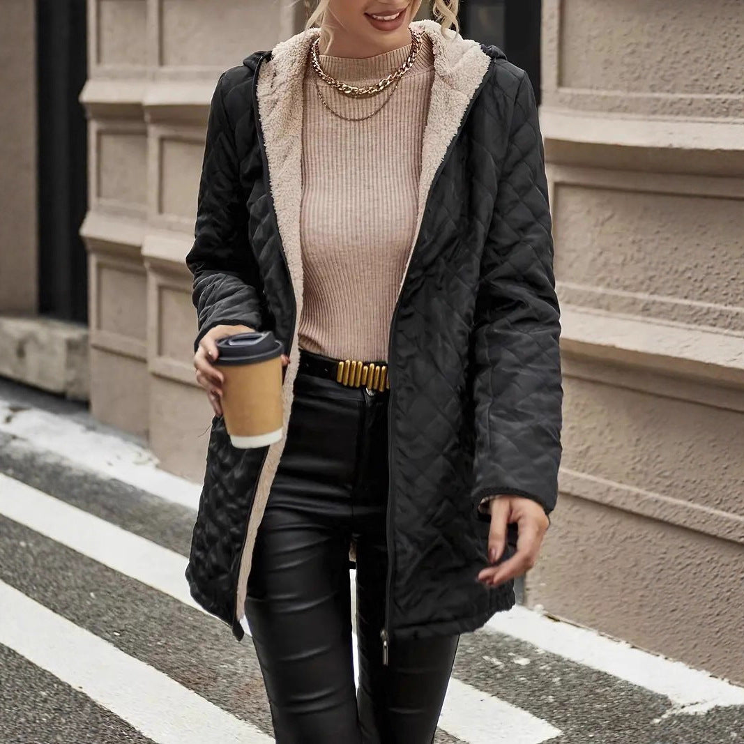 Josephine quilted puffer jacket, hands in pockets front detail shot