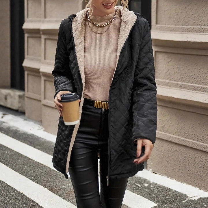 Josephine quilted puffer jacket, hands in pockets front detail shot