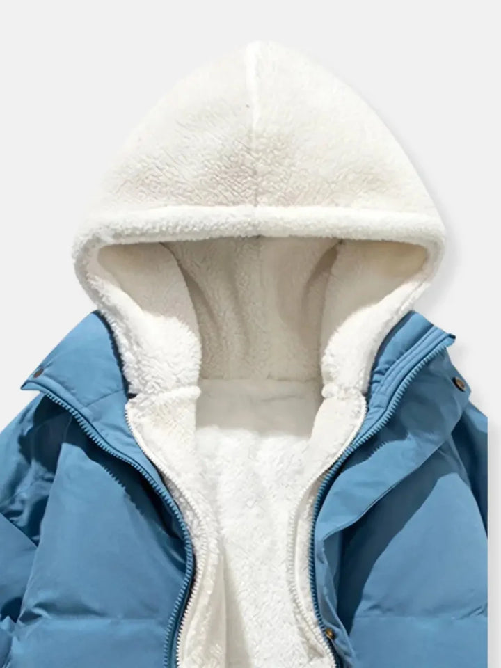 Close-up of hood lining on blue Josephine puffer jacket