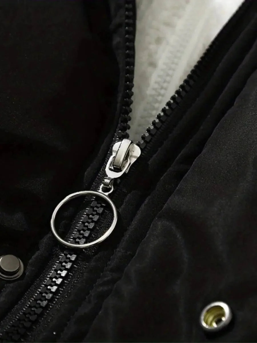 Close-up of zip pull and hardware detail on Josephine puffer jacket