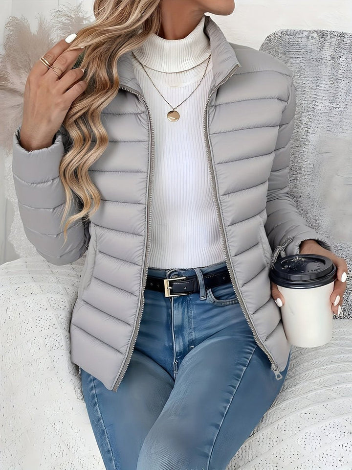 Josephine grey quilted puffer jacket with stand collar, front view