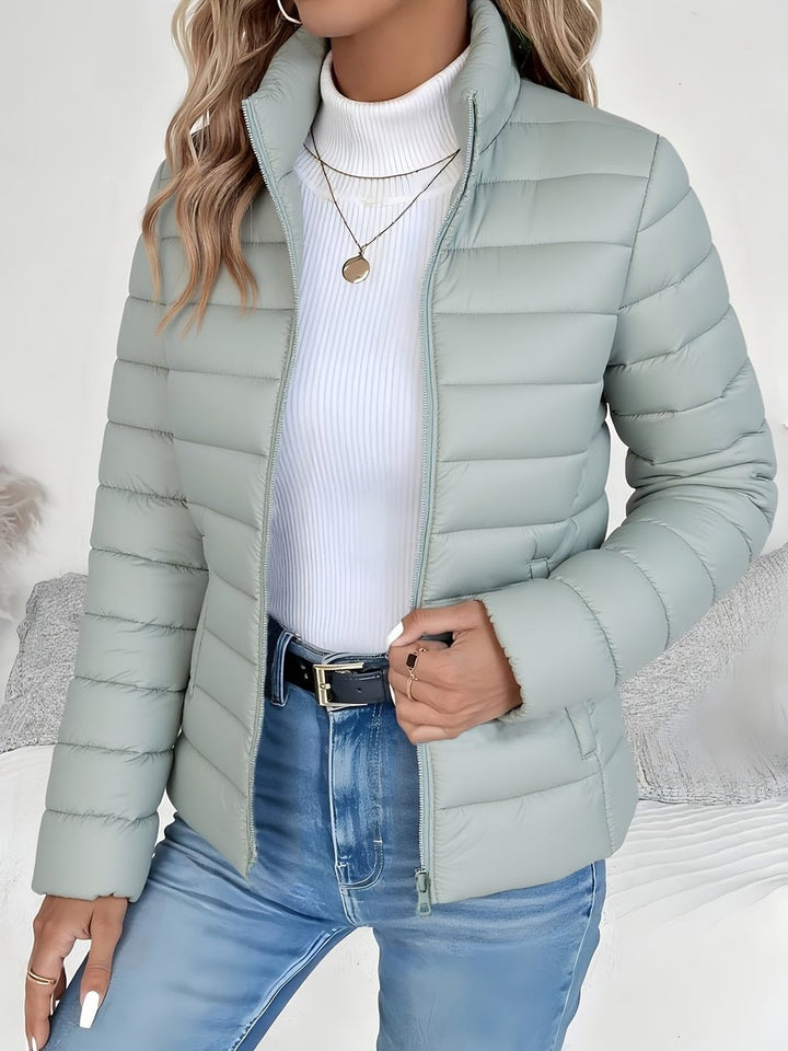 Josephine sage green quilted puffer jacket close-up, front view