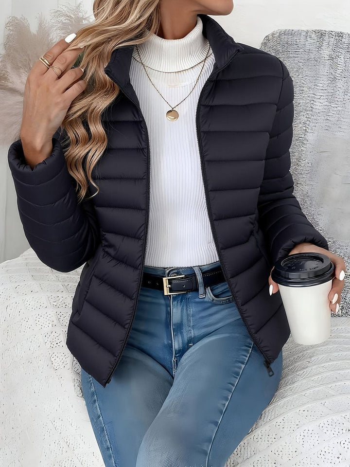Josephine black quilted puffer jacket close-up, front view