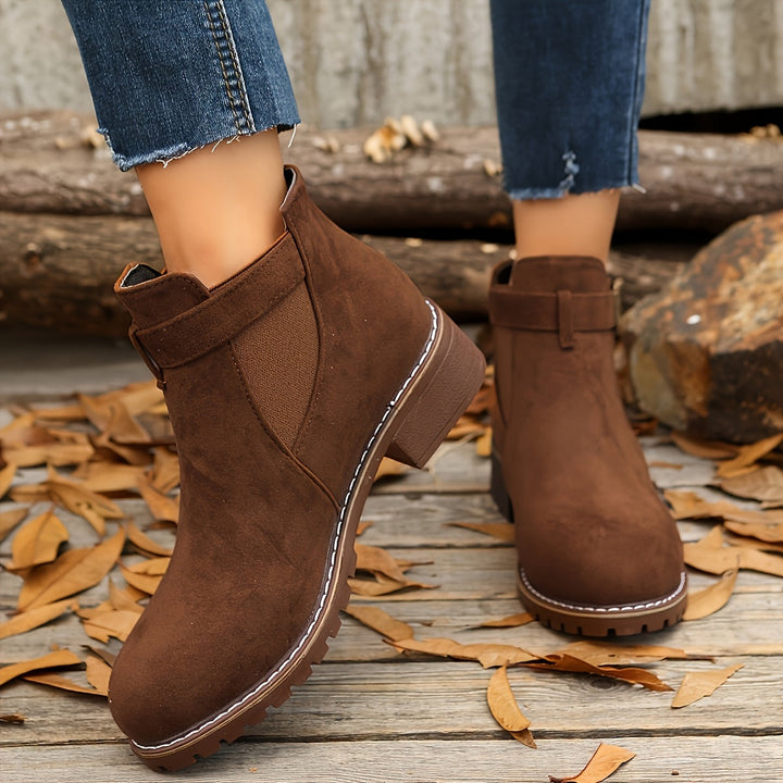 Marigold buckle strap Chelsea boots in brown, front and back view