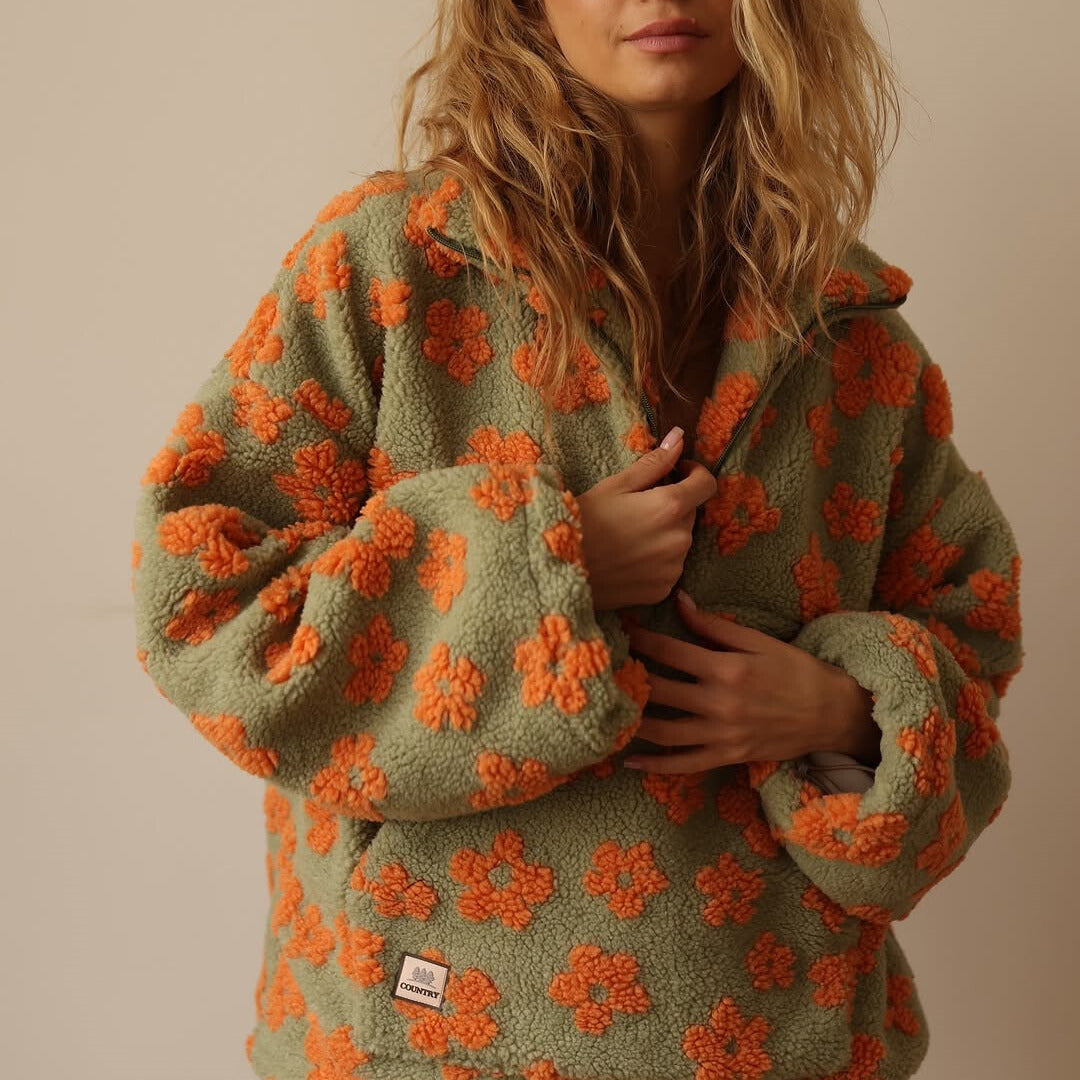 Meredith floral quarter-zip fleece pullover in green, close-up of sleeve and pocket