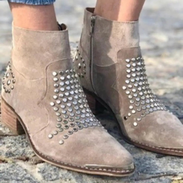 Ottilie studded ankle boots with side zip, close-up on model