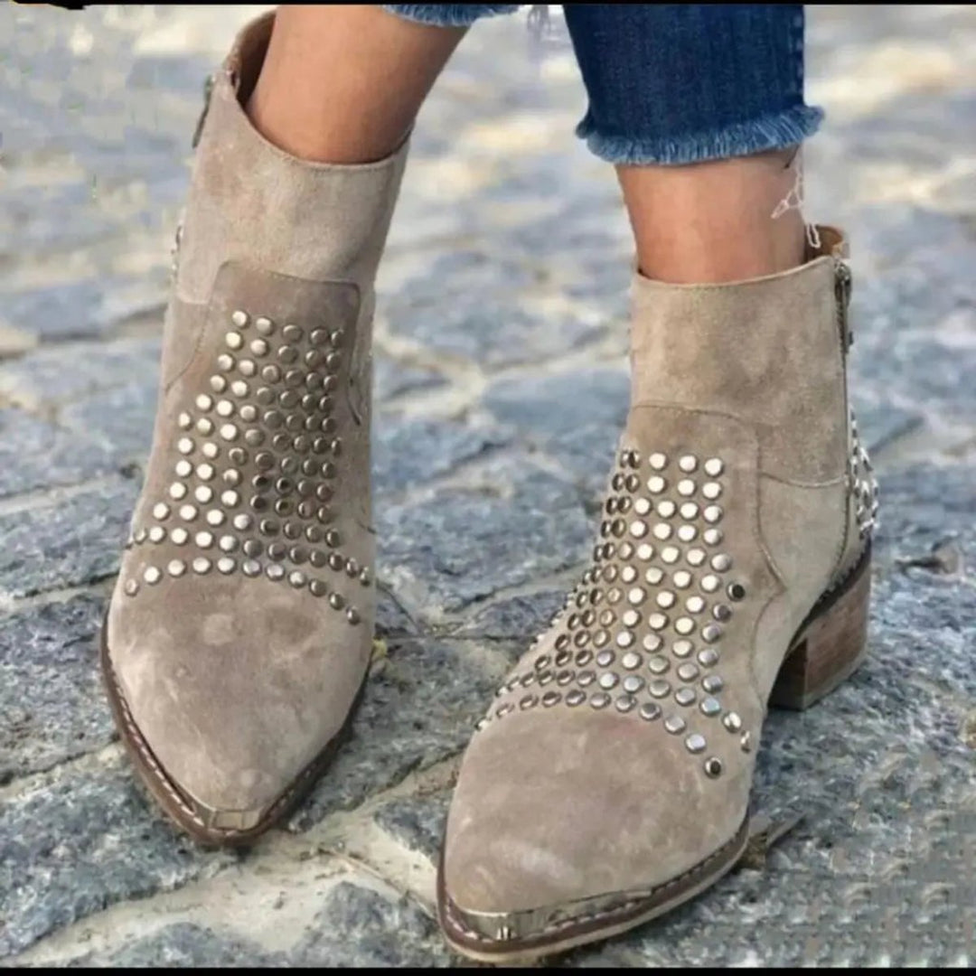 Ottilie studded pointed toe ankle boots, front view on model