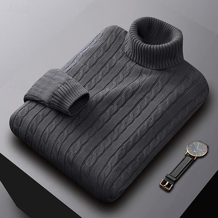 Percival dark grey cable knit turtleneck jumper folded, three-quarter view