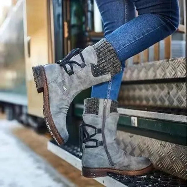 Perpetua grey knit cuff boots worn with jeans, side profile