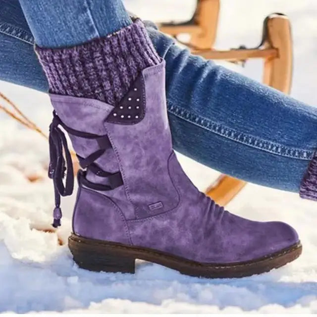 Perpetua purple knit cuff mid-calf boots, side view in snow