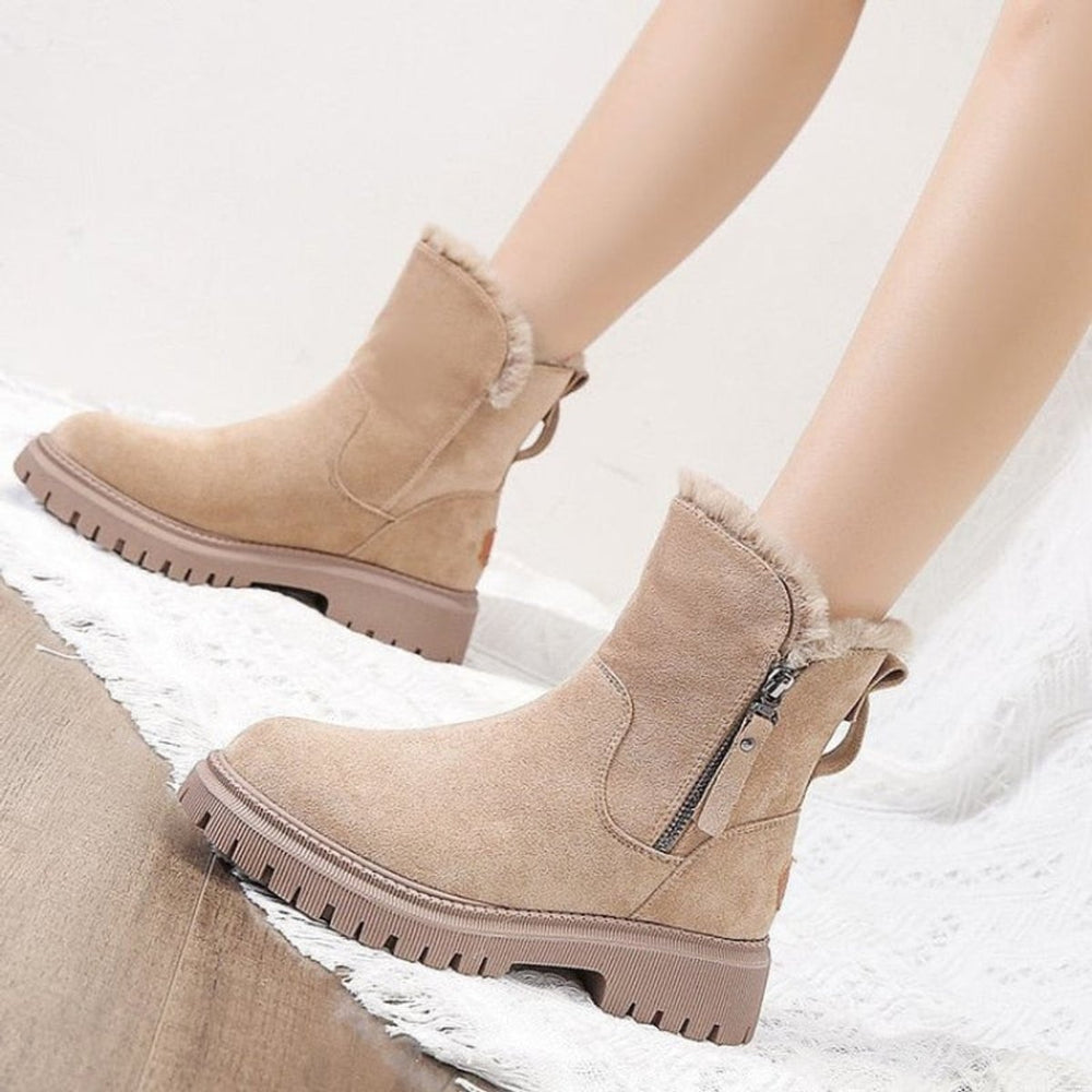 Primrose fur lined ankle boots worn with tights, side view