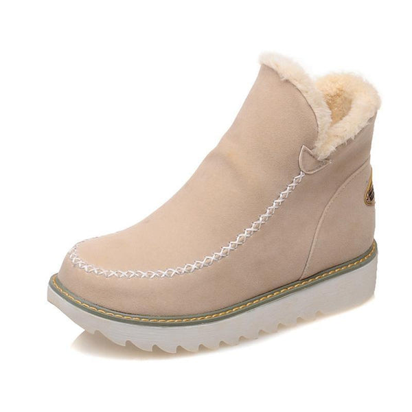 Rosalie fleece lined ankle boots in pale pink, single boot side view
