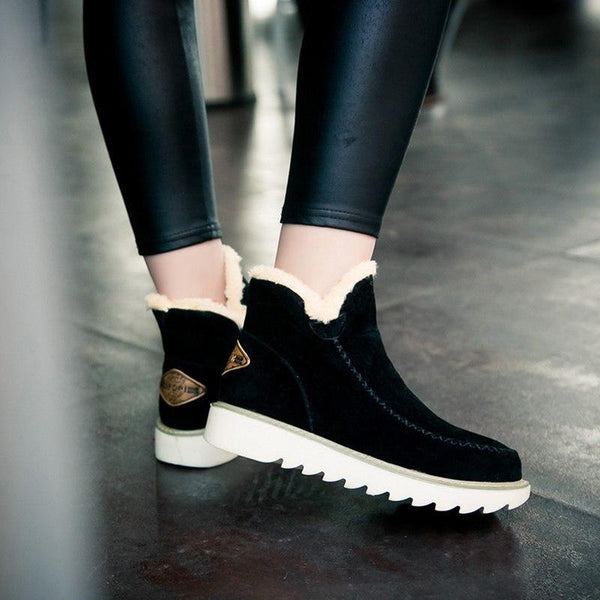 Rosalie fleece lined ankle boots in black, close-up on model