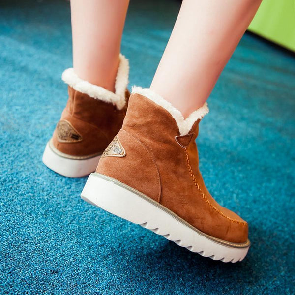 Rosalie fleece lined ankle boots in brown, back view on model