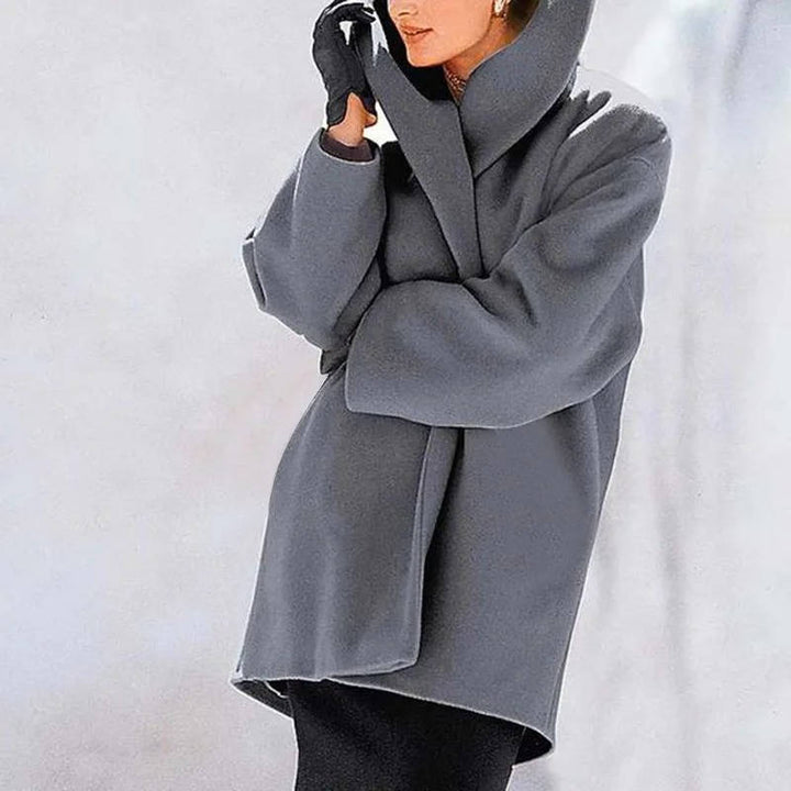 Rosalind grey shawl collar longline wool coat, front view with hood up