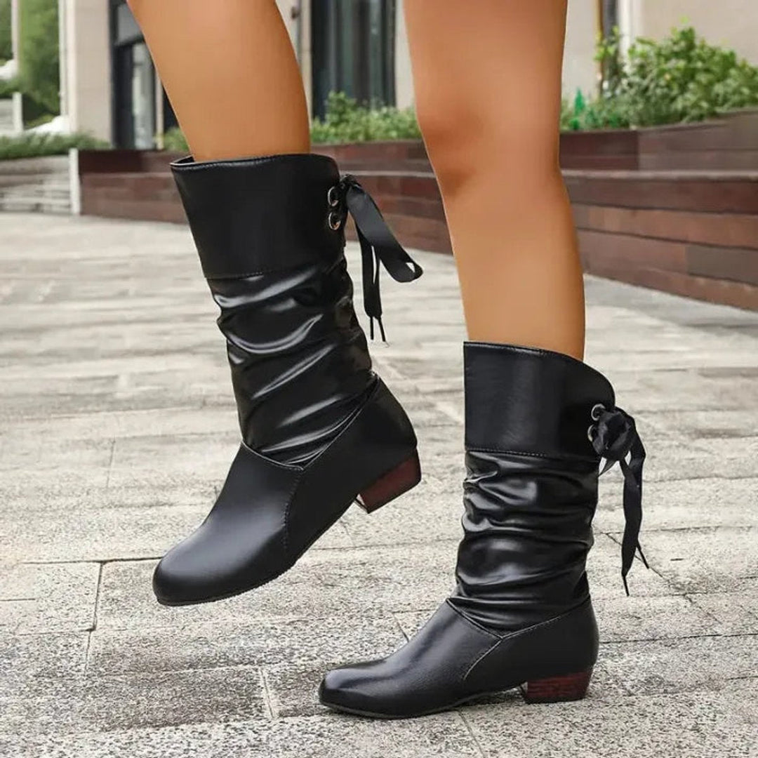 Verity red slouch calf boots, seated with ribbon detail