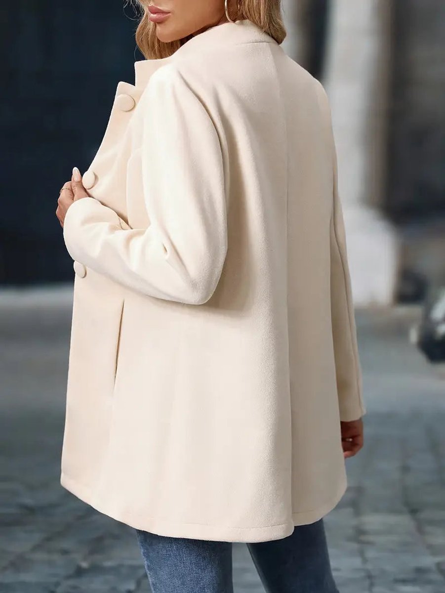 Wilhelmina cream stand-collar longline blazer coat, back view